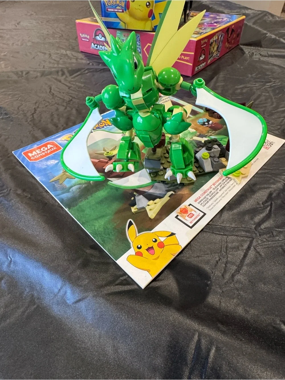 LEGO-style Eevee Building Set with Green Dragon and Themed Tin